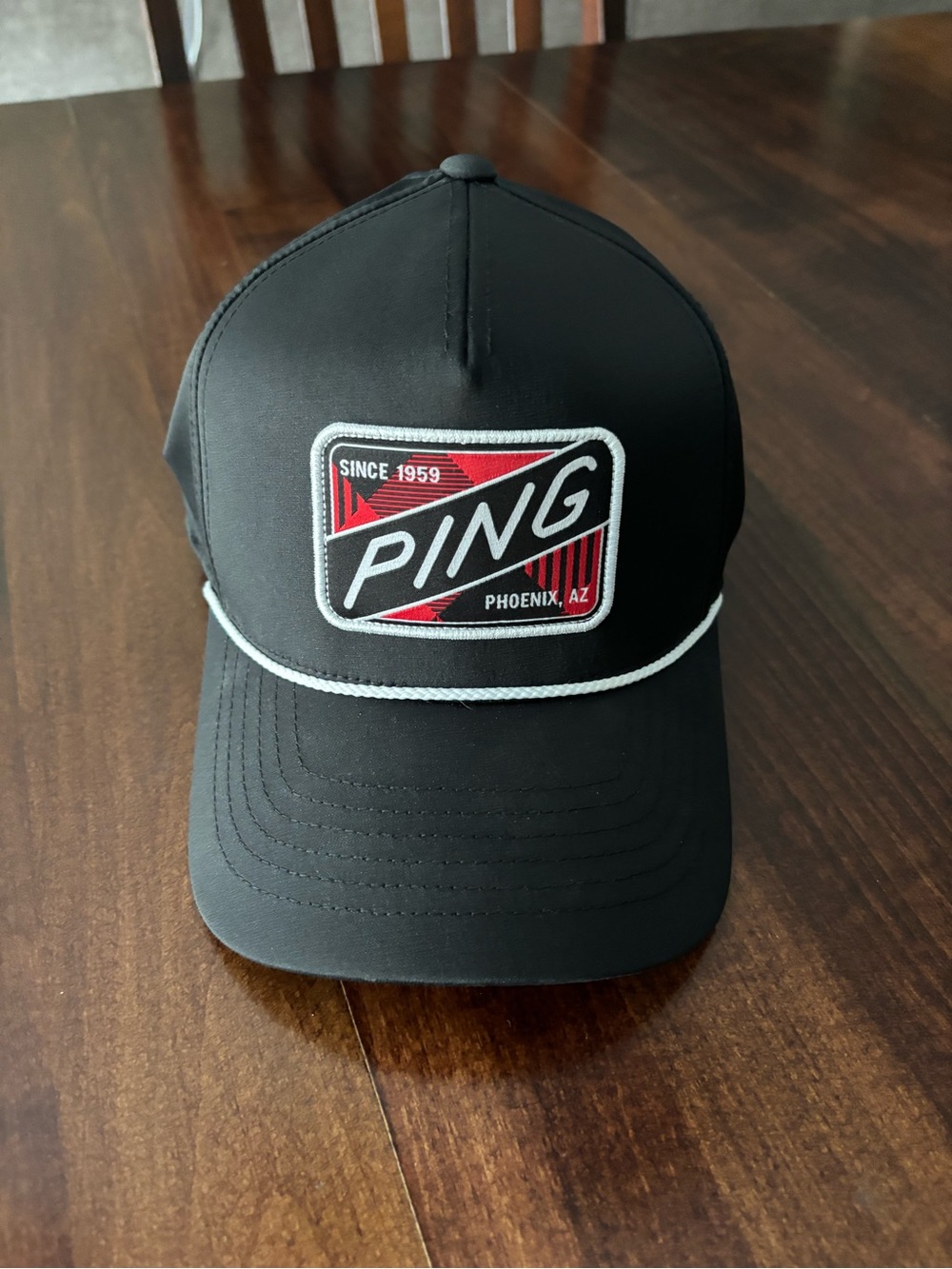 PING Black Trucker Hat with Red Logo Patch